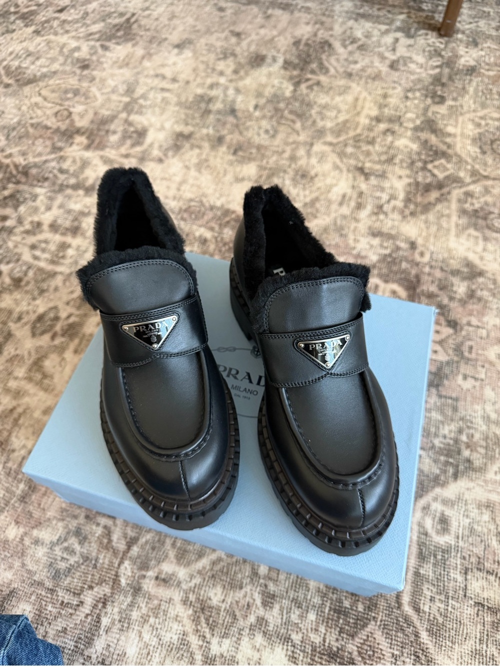 Prada Woman’s Black Leather Shearling-Lined Loafers